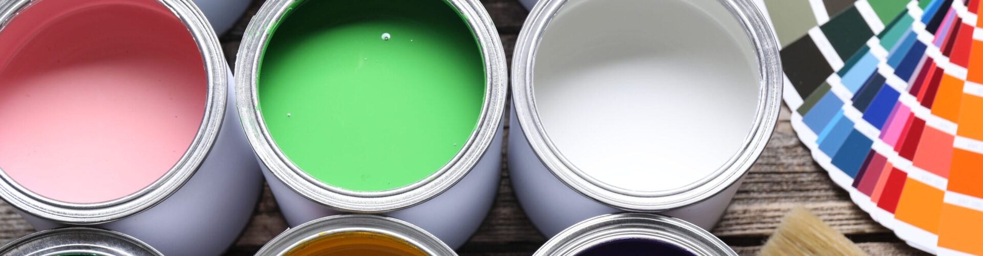compressed_cans-of-bright-paints-brush-and-color-palettes-on-2026-01-11-11-10-04-utc
